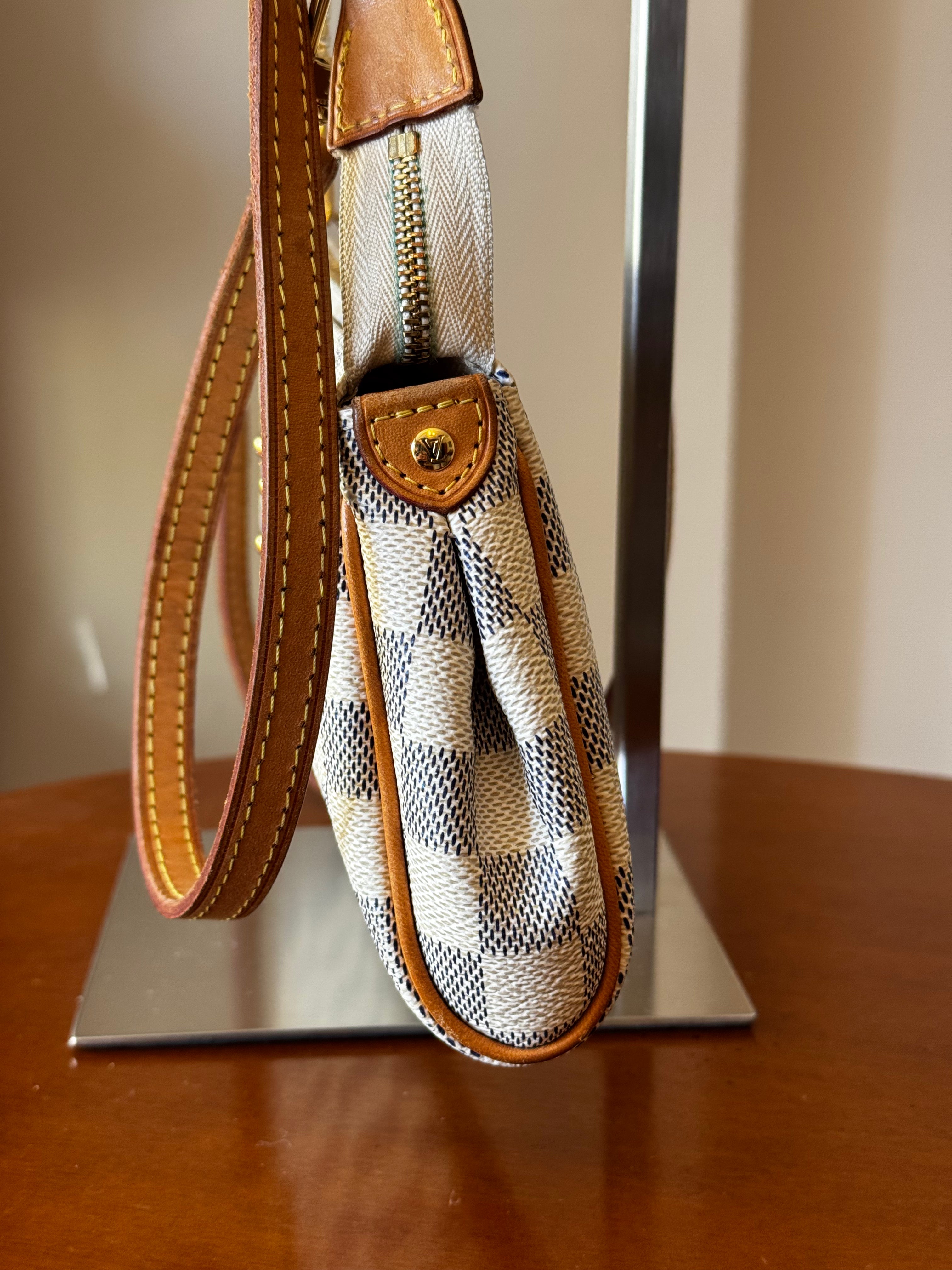 Pochette Eva Louis Vuitton