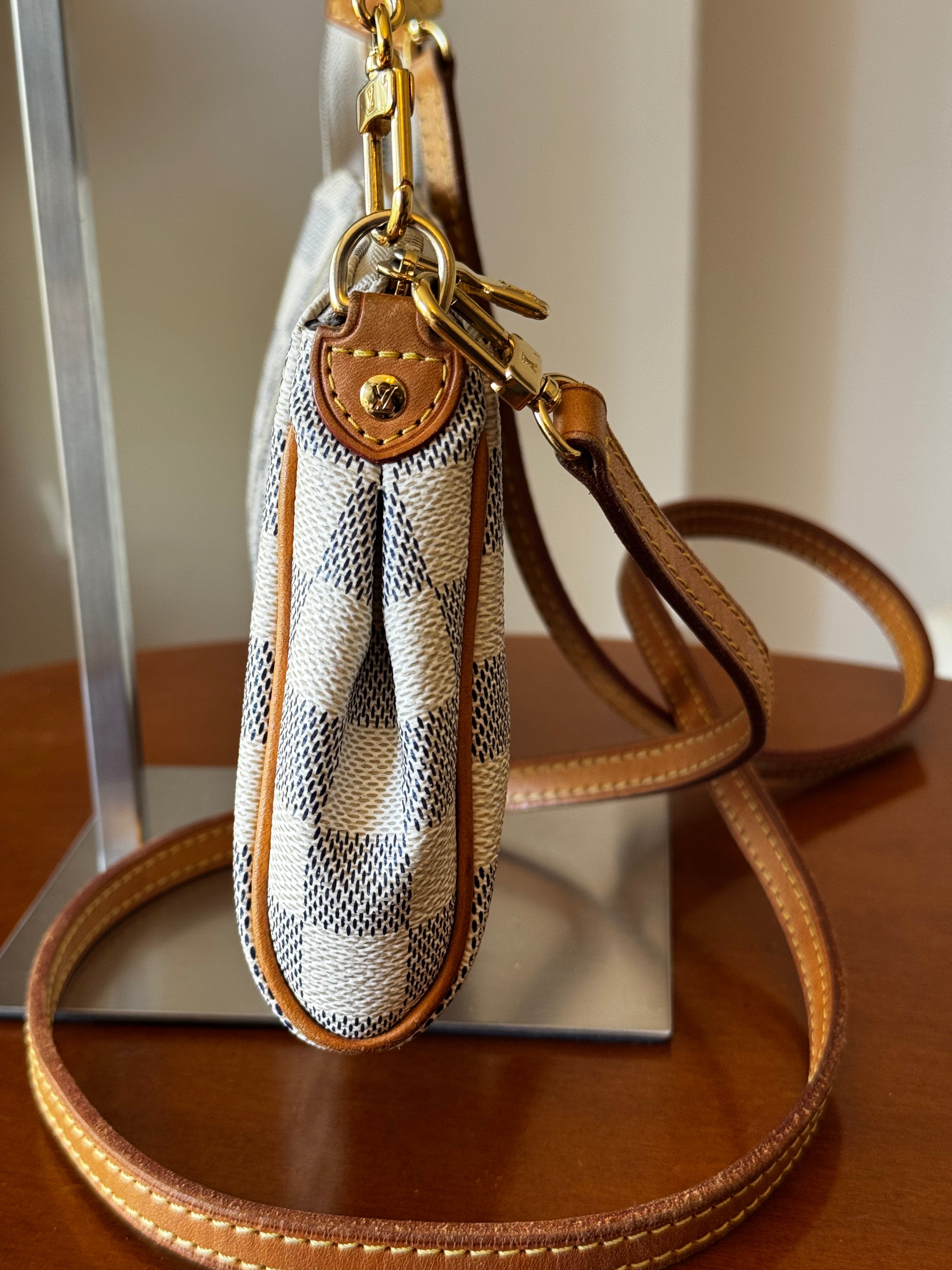 Pochette Eva Louis Vuitton