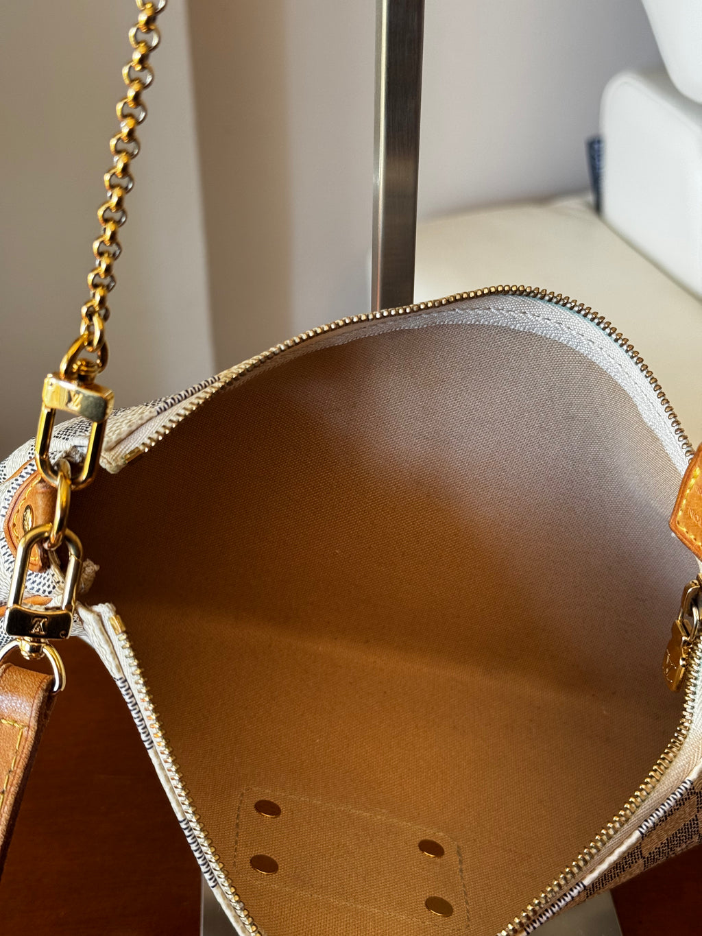 Pochette Eva Louis Vuitton